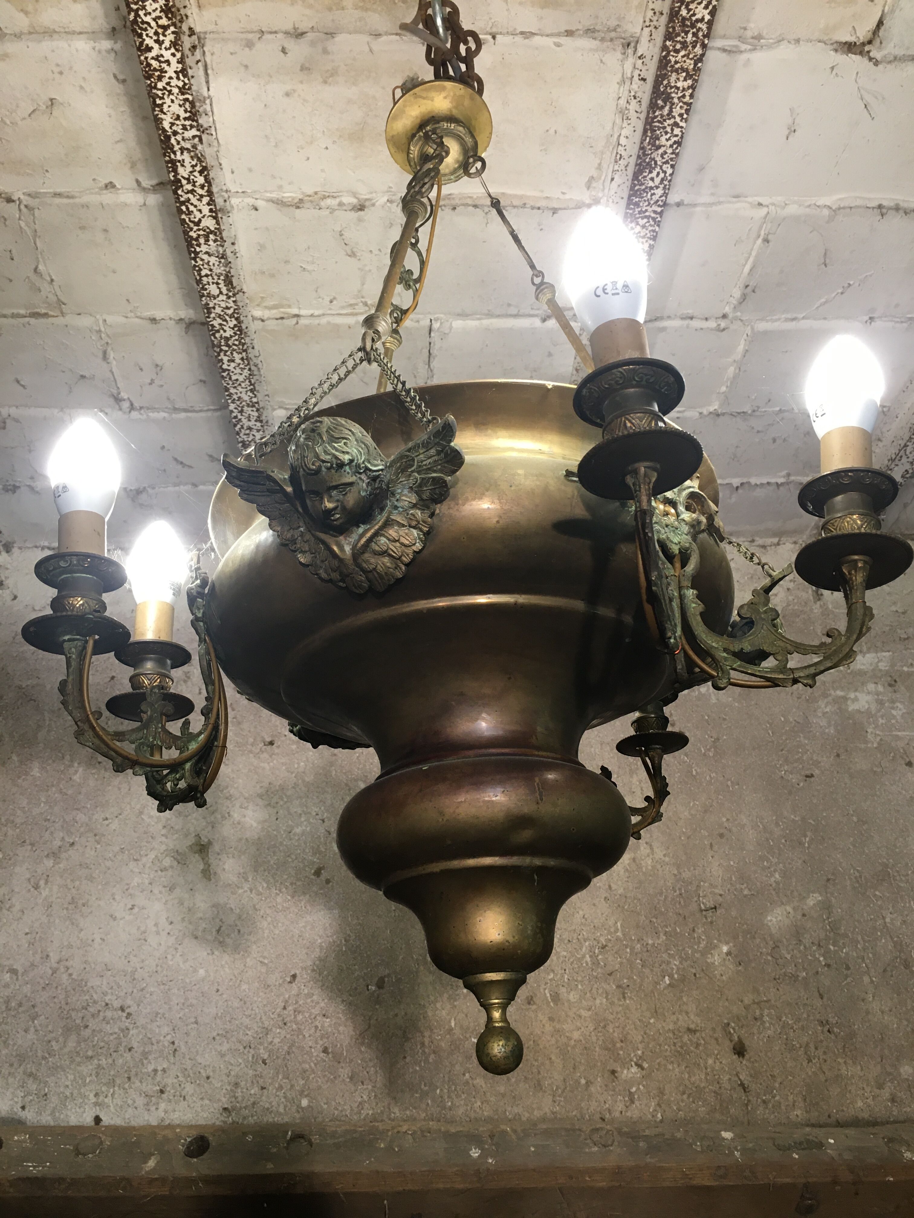 Brass chandelier with angels