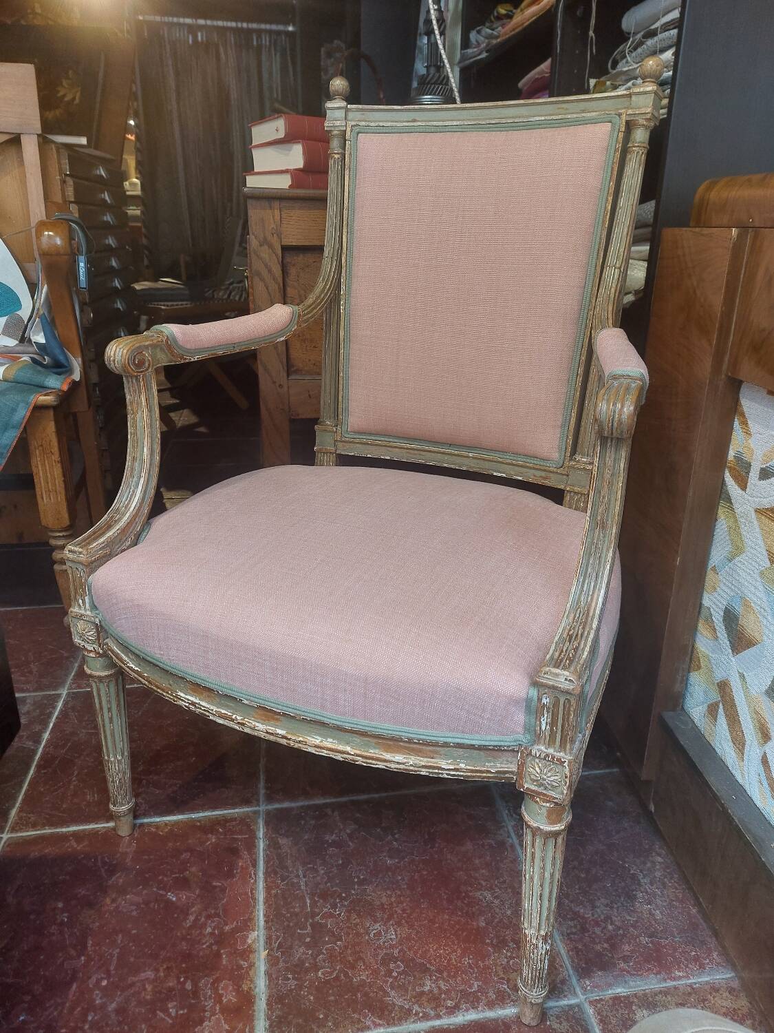 Patinated Louis XVI style armchair