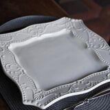 Set of 12 enameled ceramic plates
