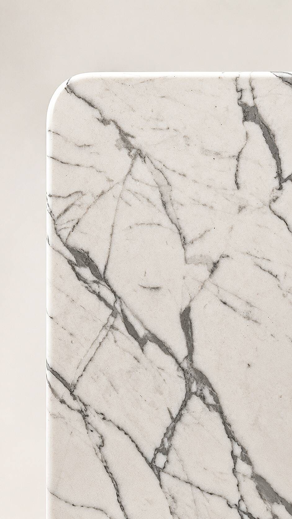Table with a solid Carrara marble base.