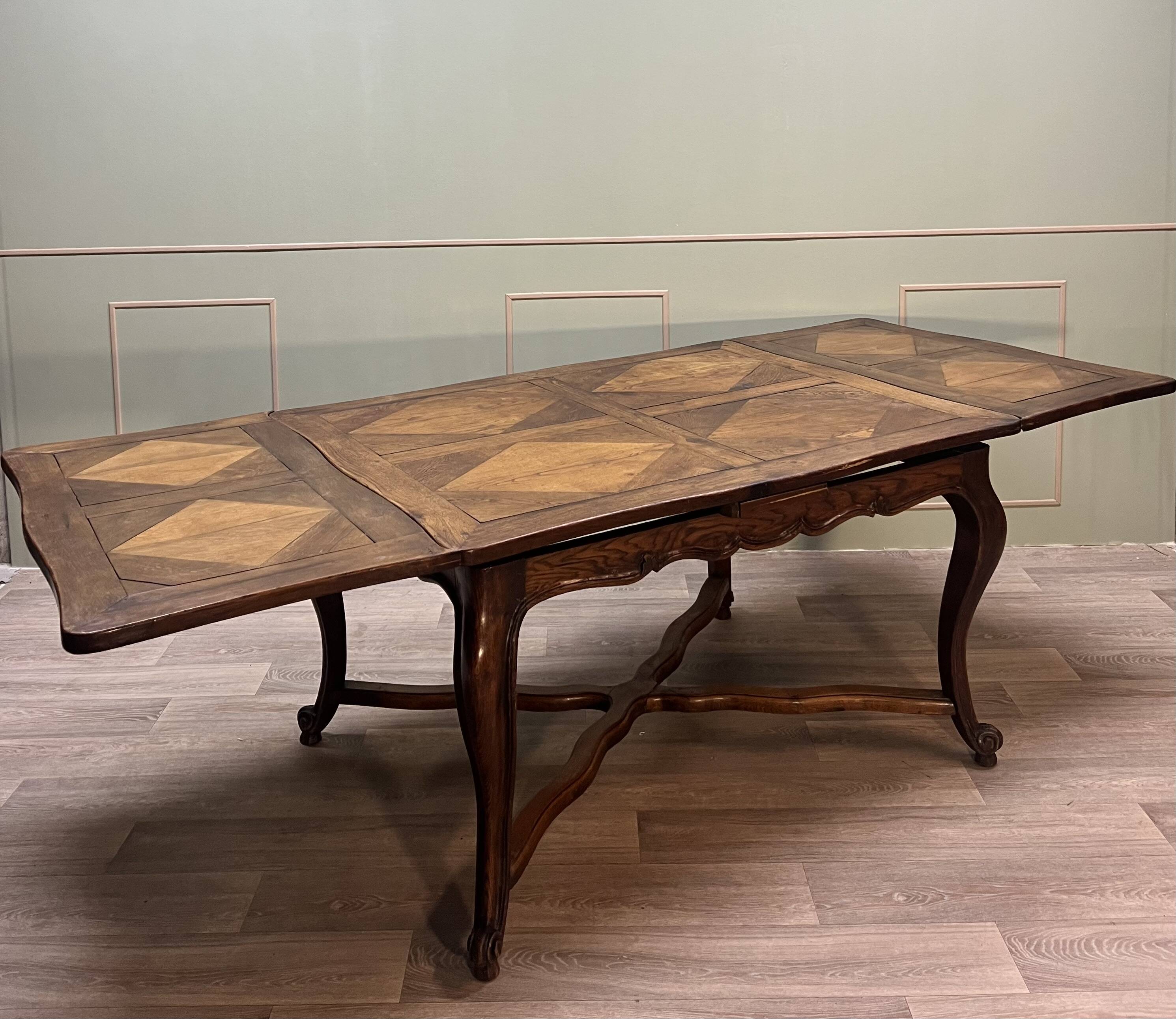 Dining room table in natural wood called italian style with parquet top 19th century