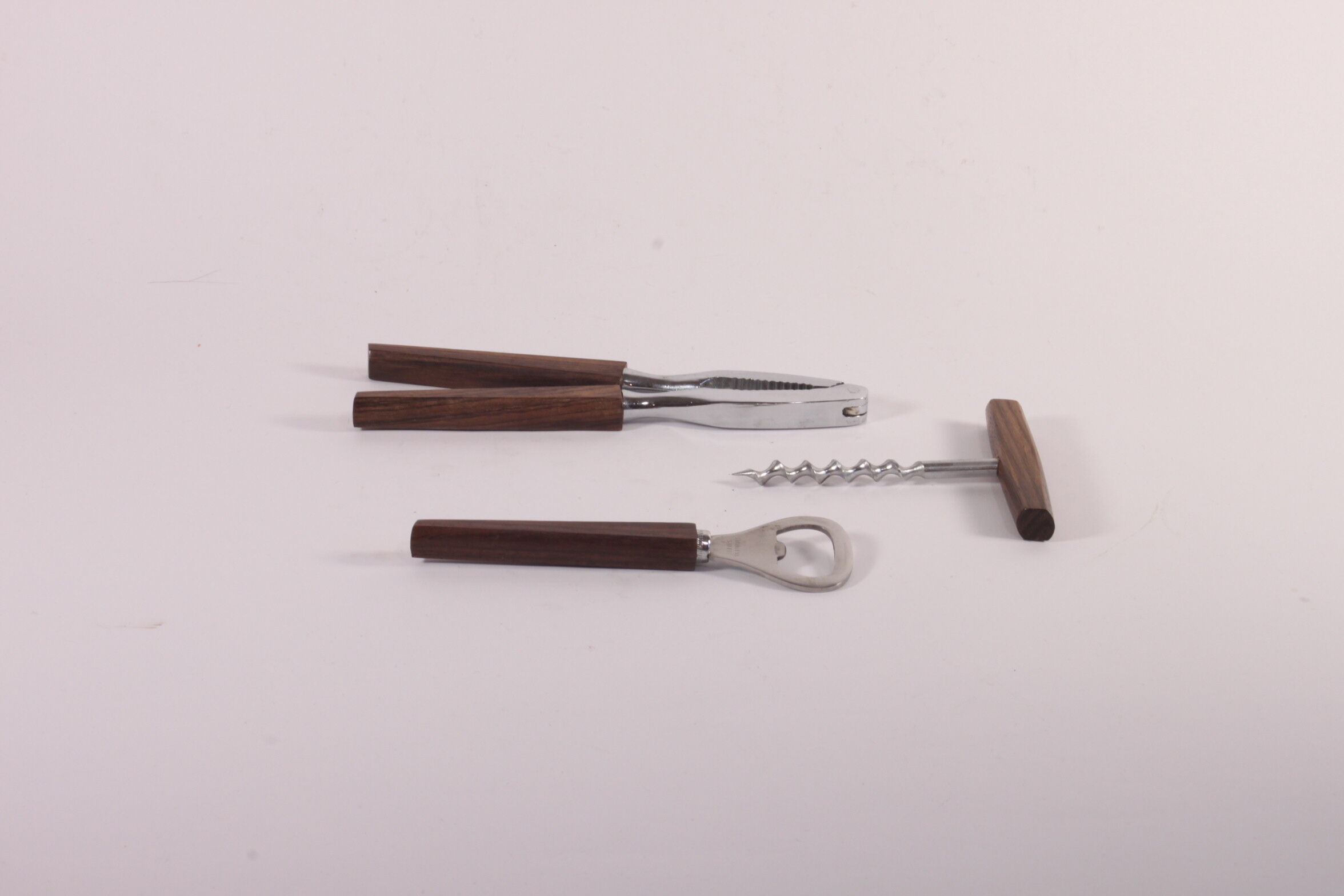 Teak wooden bottle opener, corkscrew and nutcracker set