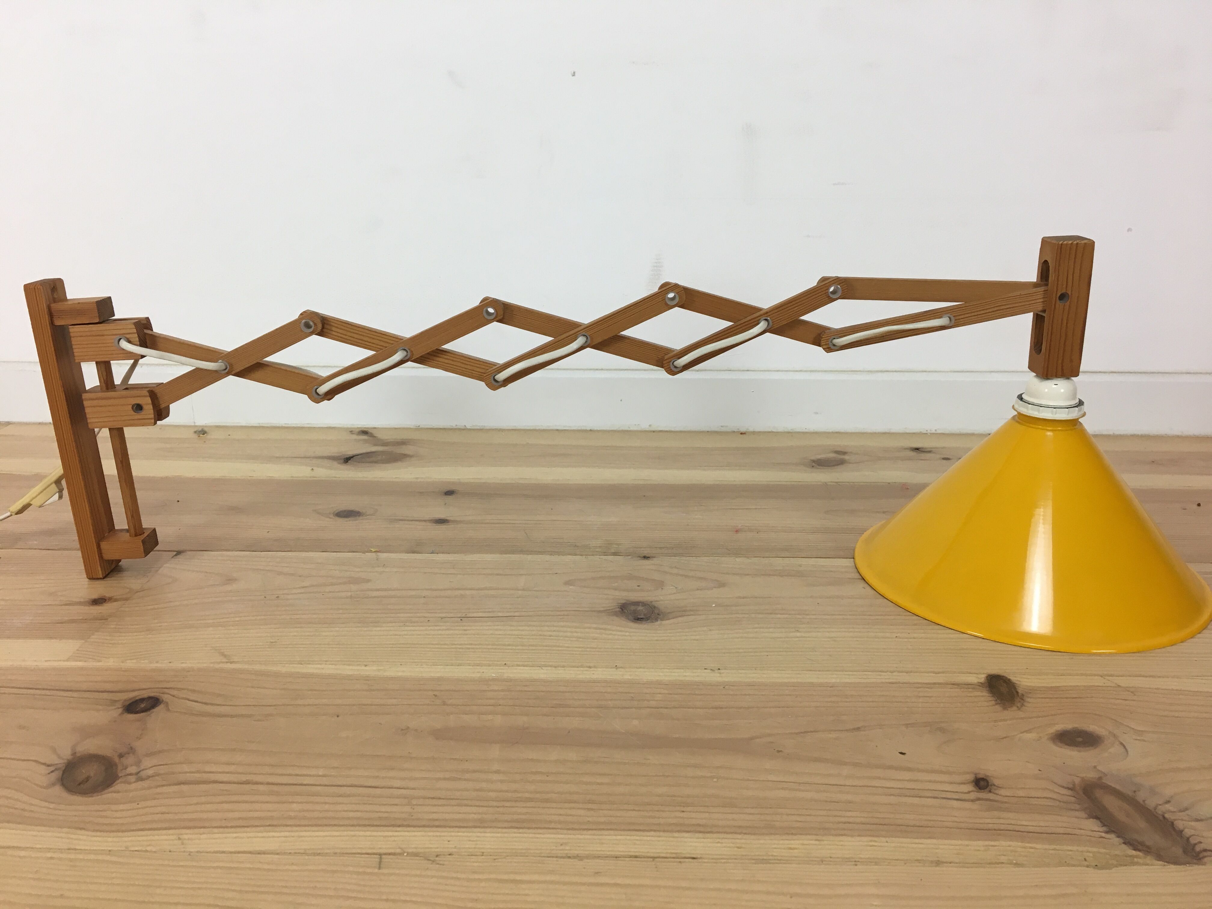 60s accordion sconce, pine, yellow metal reflector