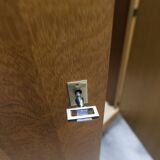 French wardrobe with tapered legs, 3 doors, 1 mirror (27*130), and 1 drawer.