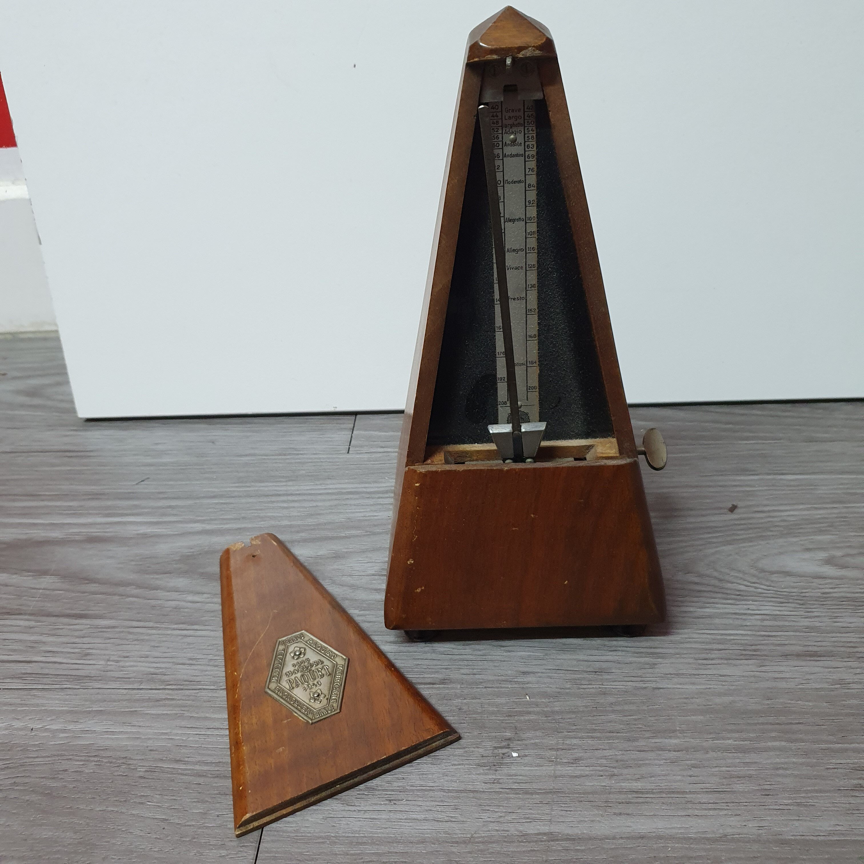 Old wooden metronome