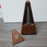 Old wooden metronome