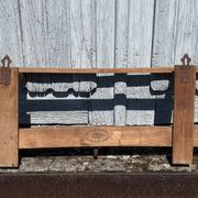 Wall-mounted coat rack in solid wood with shelf
