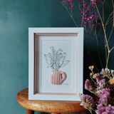 Composition of a bouquet of lily of the valley in a clay mug