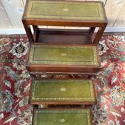 19th-century English library staircase, green leather with gold detailing.