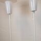 Pair of mid-century modern Luxus floor lamps, Sweden, 1970s.