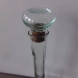 Glass bottle with its cap