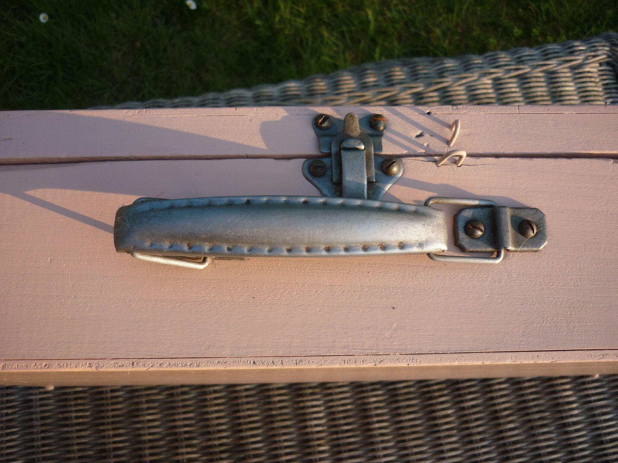 Pink wooden suitcase