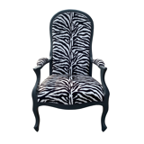 Voltaire armchair upholstered with zebra pattern fabric