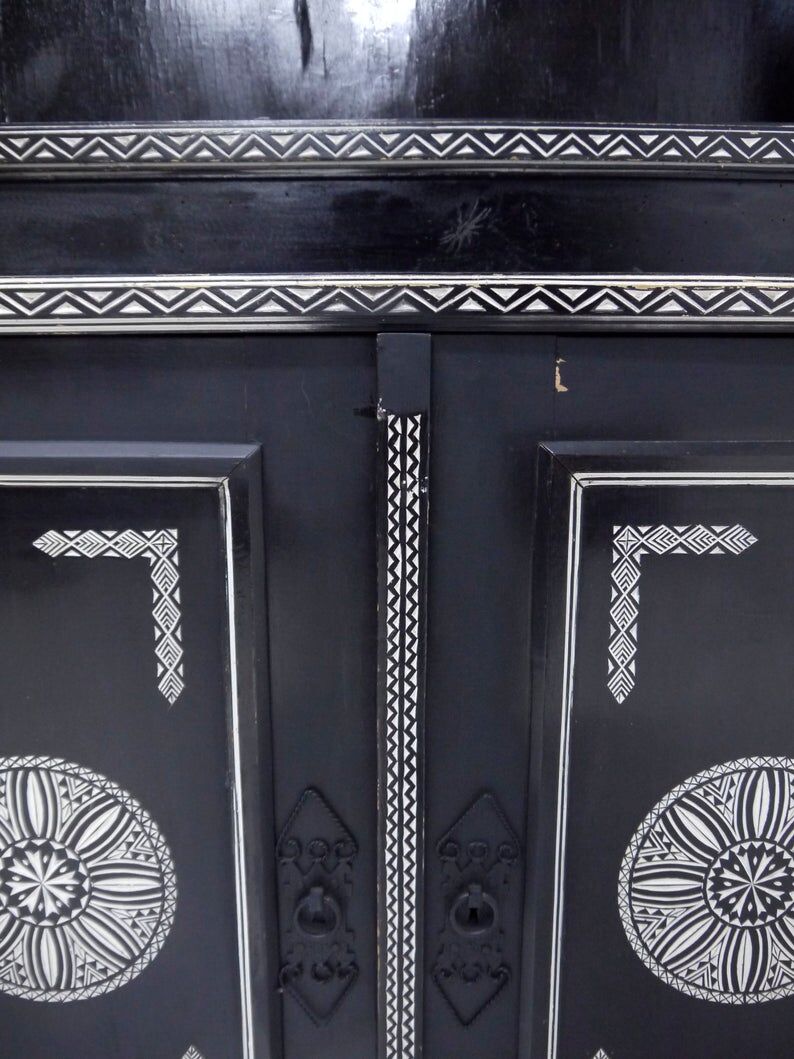 Antique wooden cabinet painted in black and with incised white painted decorations, Ettore Zaccari, Italy c 1910