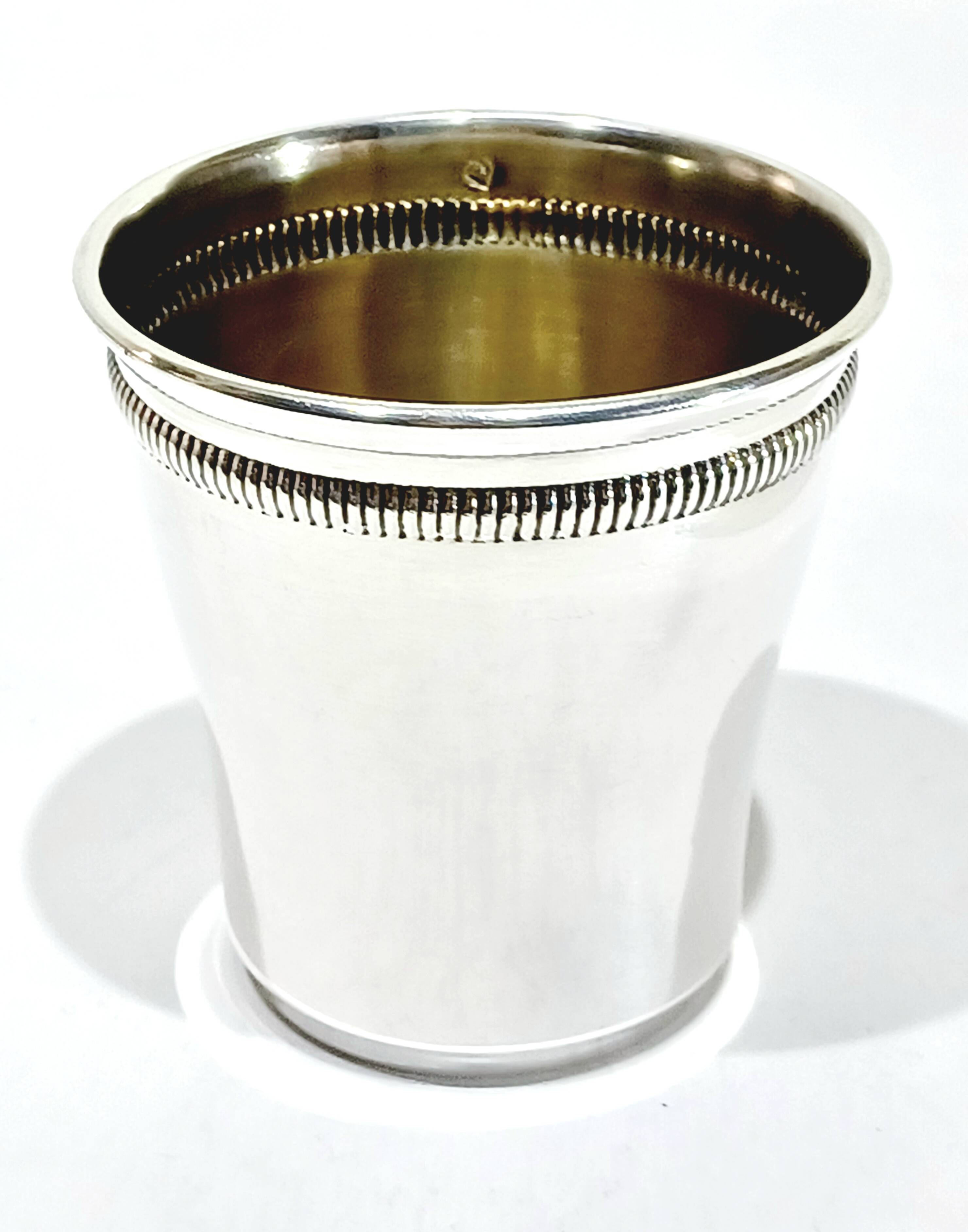 Solid silver cup with gadroon motif