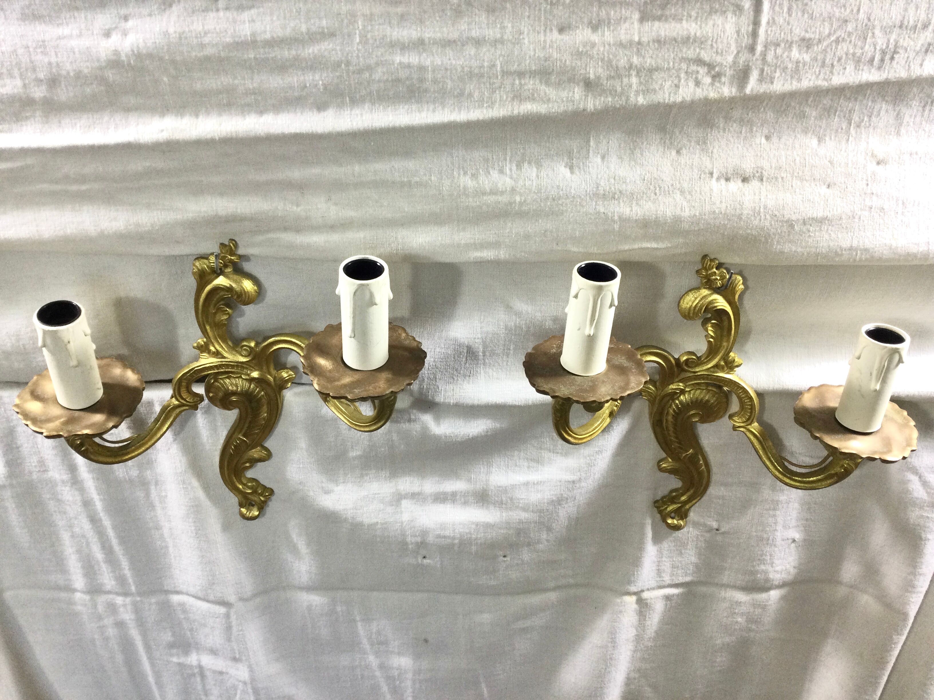 Pair of Louis XV style bronze sconces