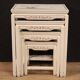 Four lacquered and painted living room coffee tables