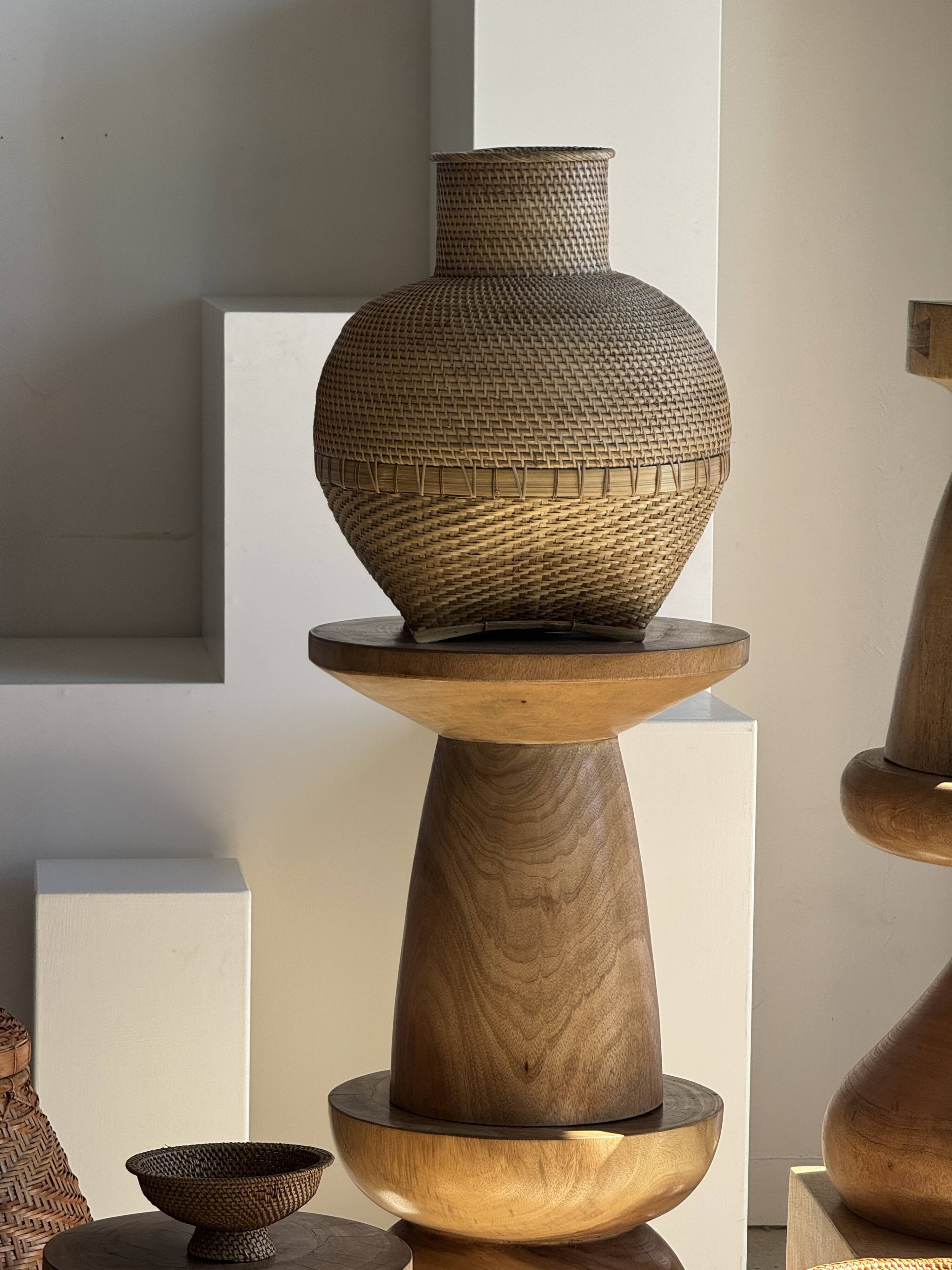 Natural solid mango side table (monoxyle) with conical legs.