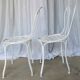 Pair of antique garden chairs, wrought iron, white paint.