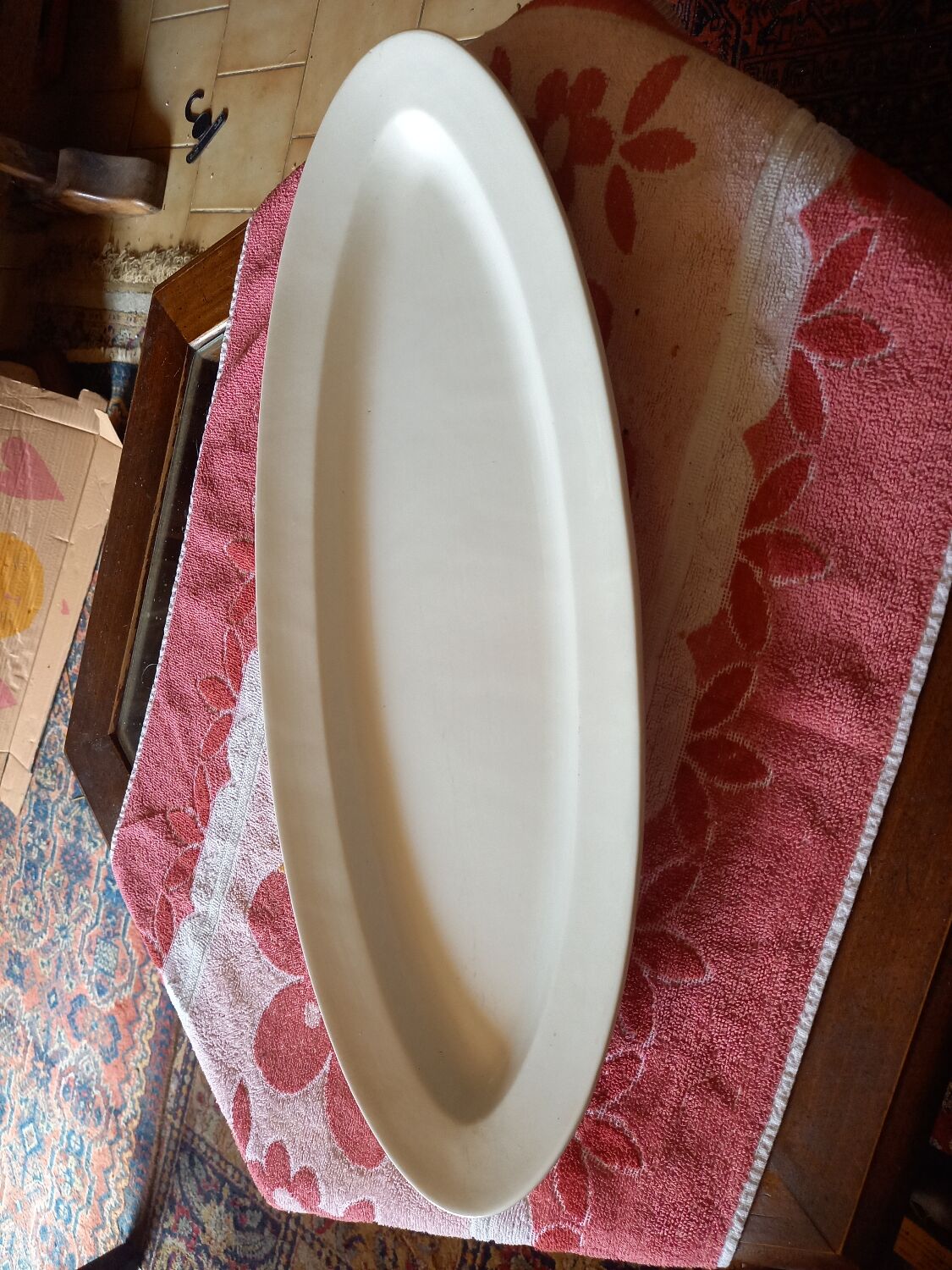 Old white earthenware fish dish