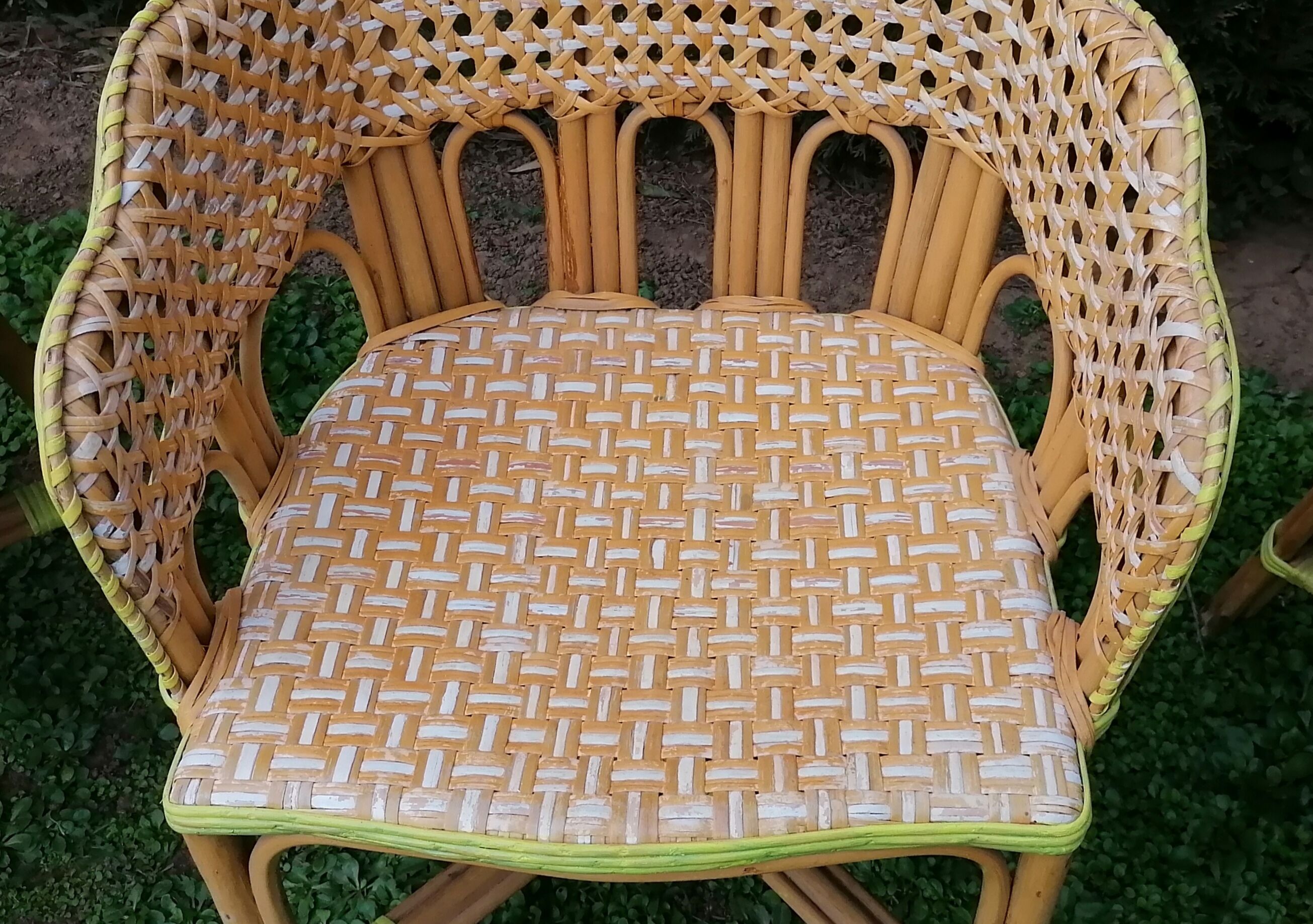 3 woven rattan armchairs