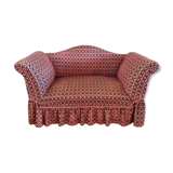 Two-seater sofa on wheels