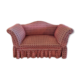 Two-seater sofa on wheels