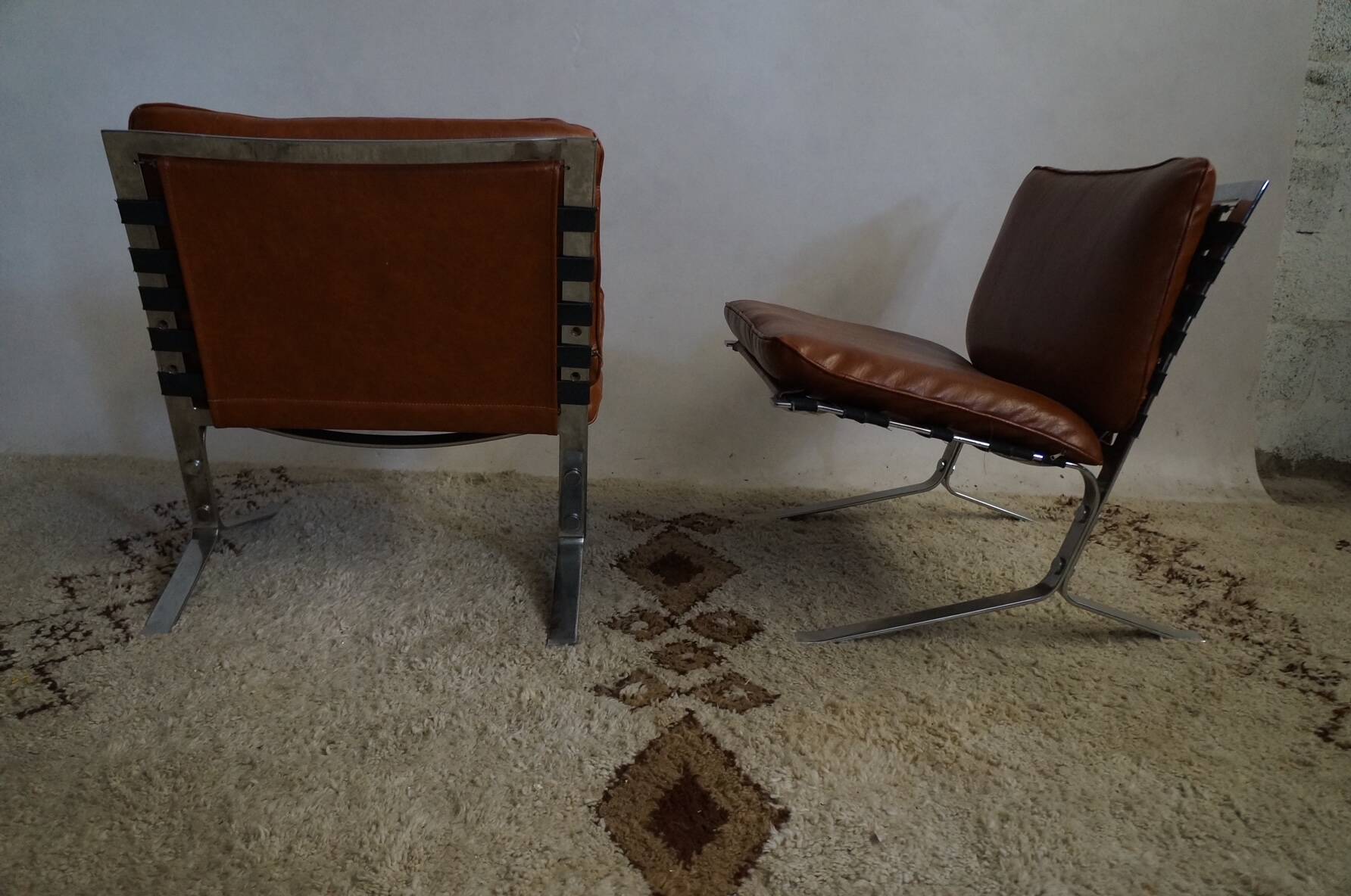 pair of Joker Olivier Morgue armchairs