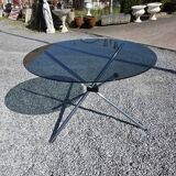 Round chrome metal table with smoked glass top from the 70s