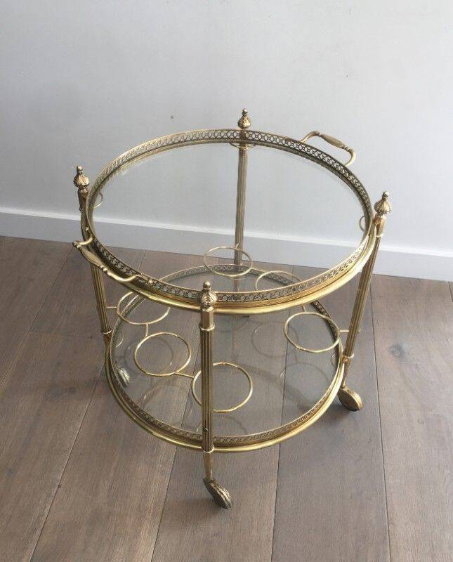 Round brass rolling table attributed to Maison Jansen