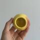 Yellow ceramic pear-shaped salt shaker