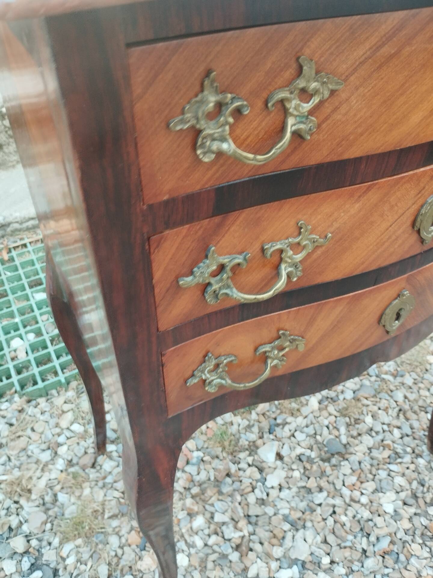 Antique marquetry commode with marble top in Louis XVI style.