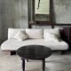 Antique round coffee table in Indonesian teak with turned legs.
