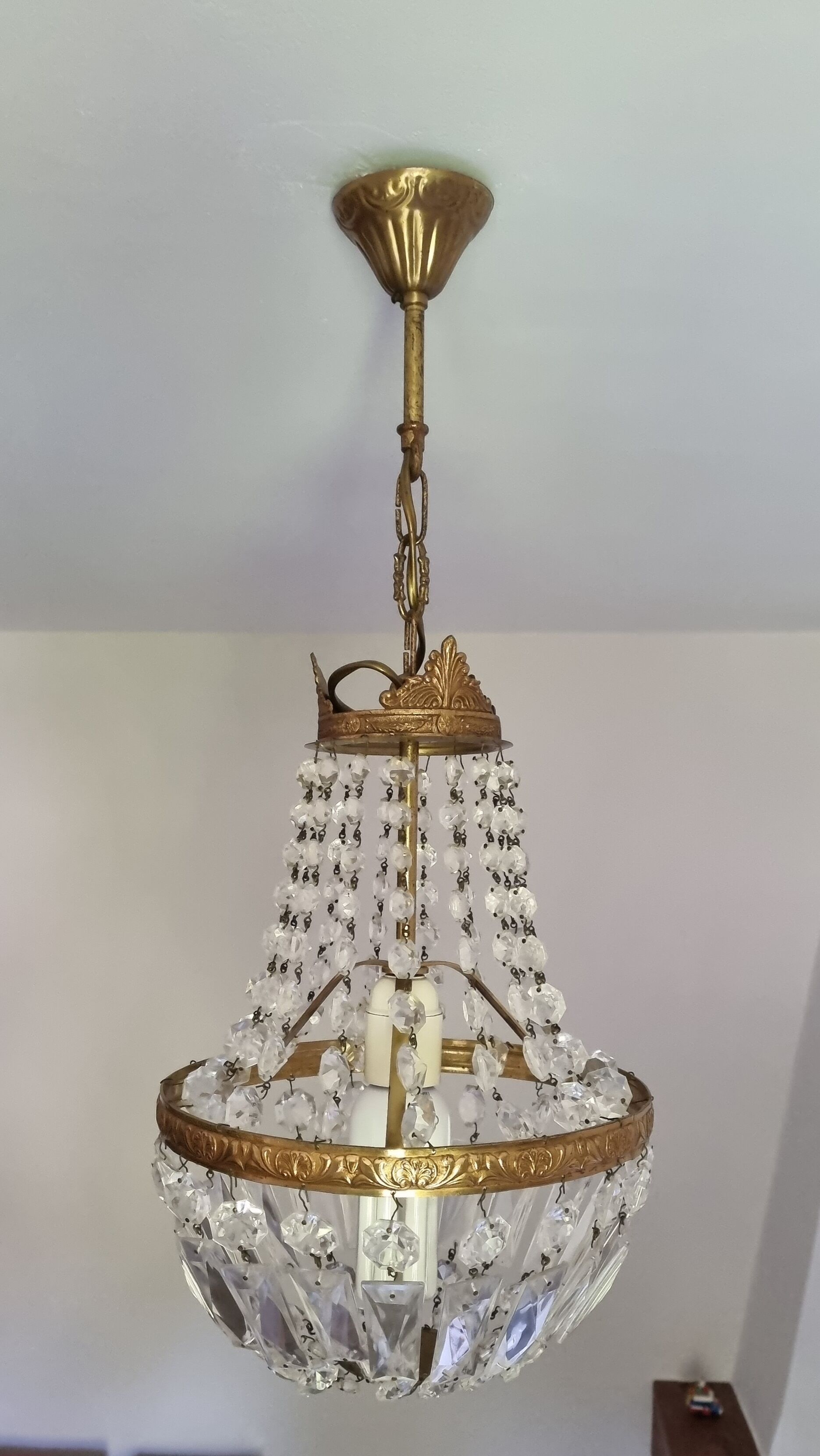 Brass chandelier and grapevine glass