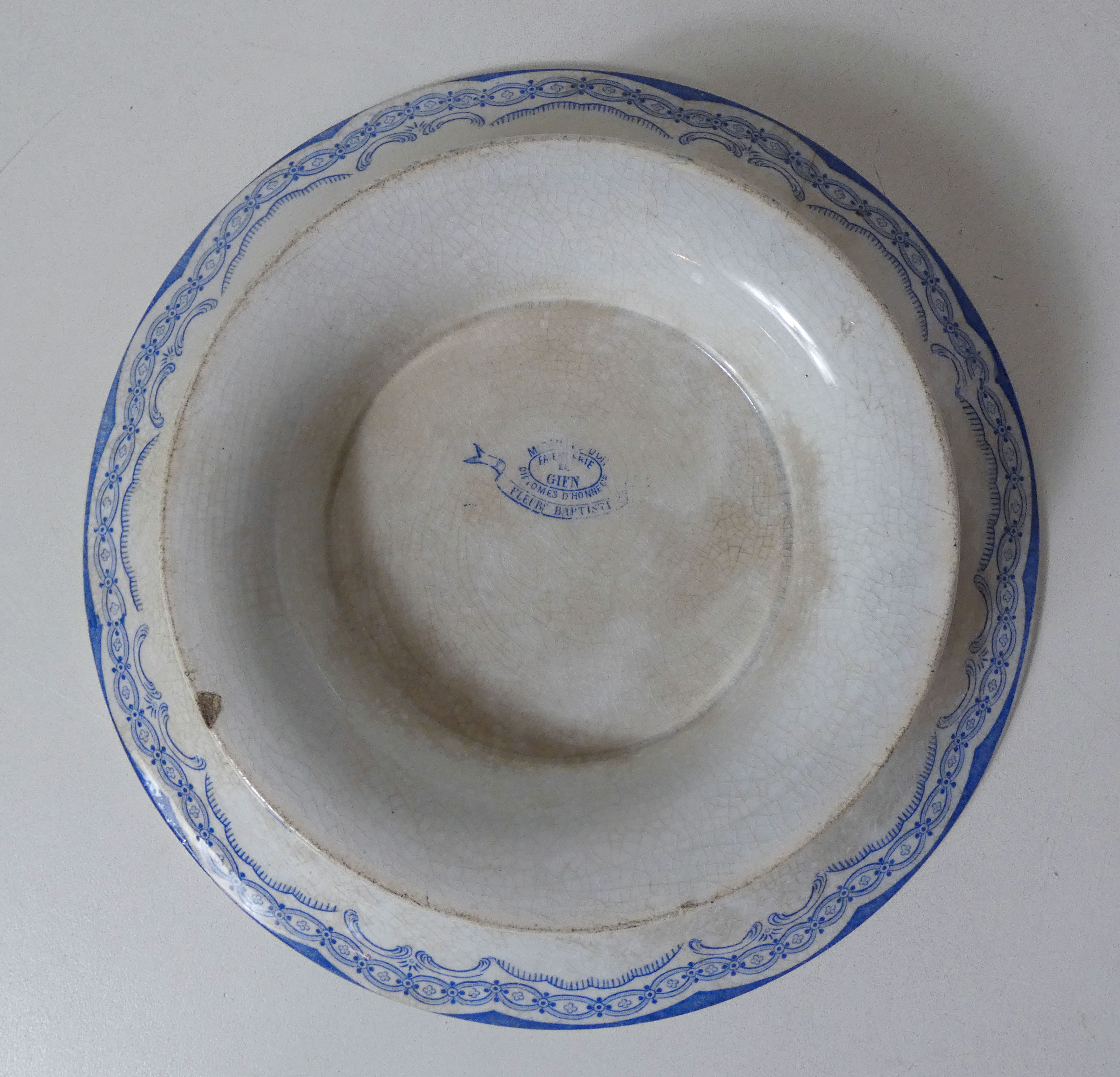 Gien old plate on butterfly stand, Terre de Fer Gien