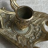 Bronze hand candlestick in the shape of a peacock