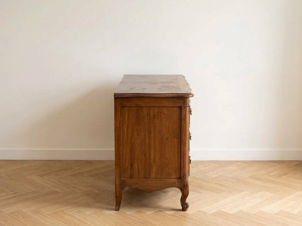 Antique curved wooden commode in classic style