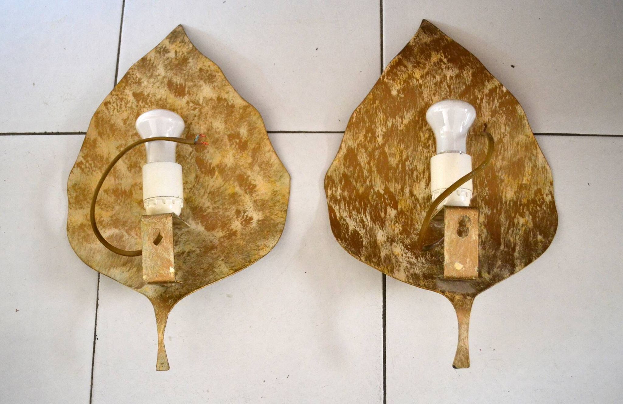 Pair of gold metal leaf wall lights from the 70s/80s.