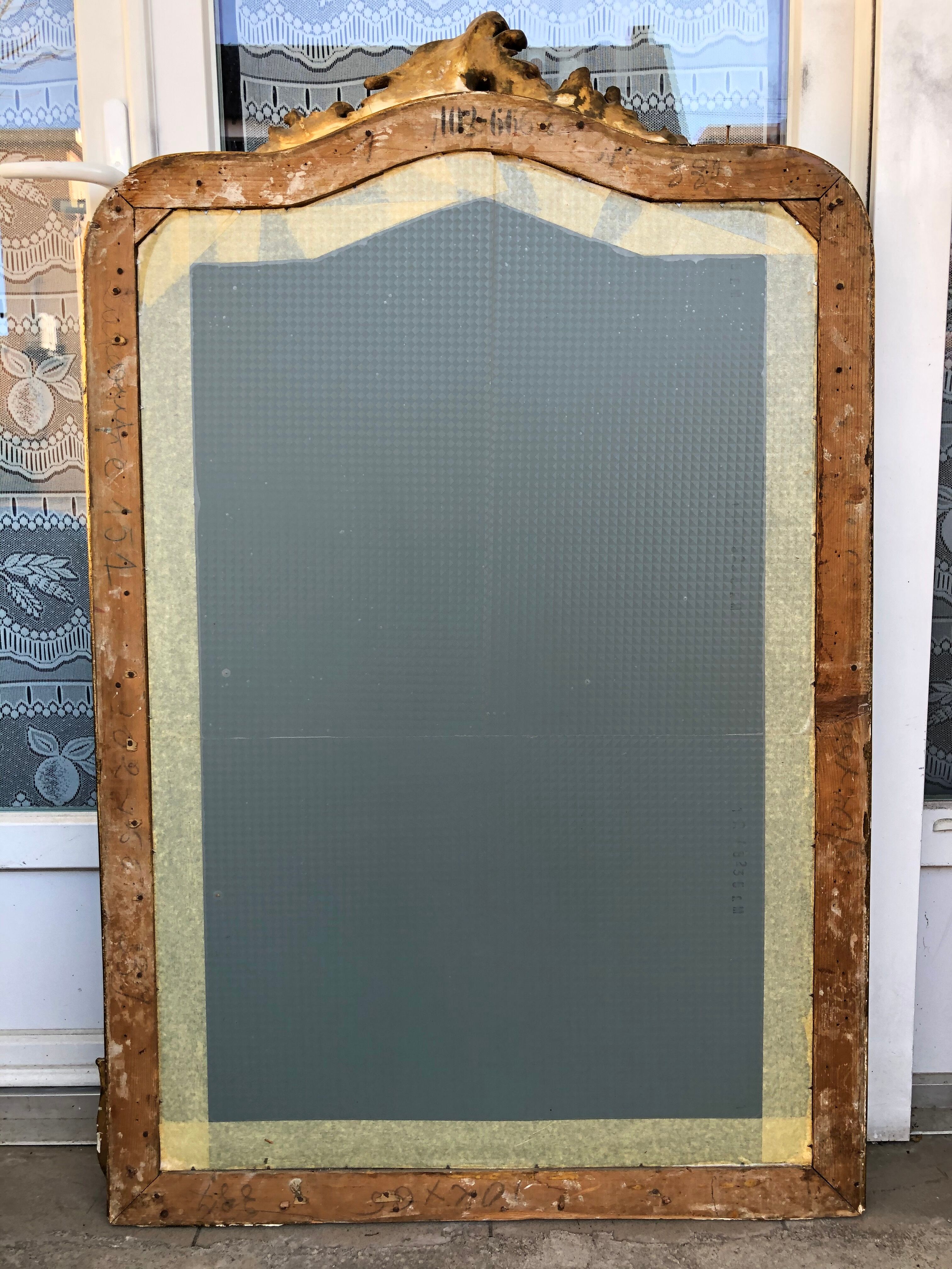 Old mirror in gilded wood 125x79cm