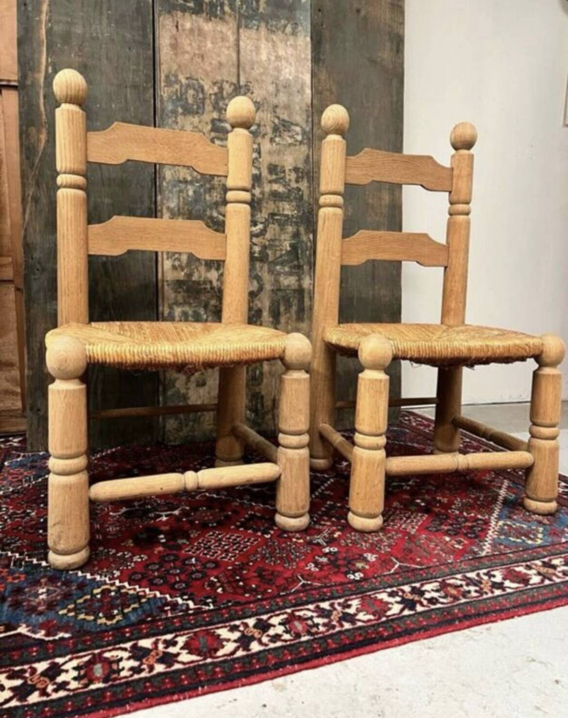 Pair of Dudouyt straw chairs