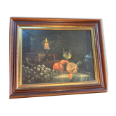 Tableau nature morte fruits raisin et oranges