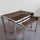 Vintage nesting tables from the 1970s, chrome and smoked glass, mid-century modern.