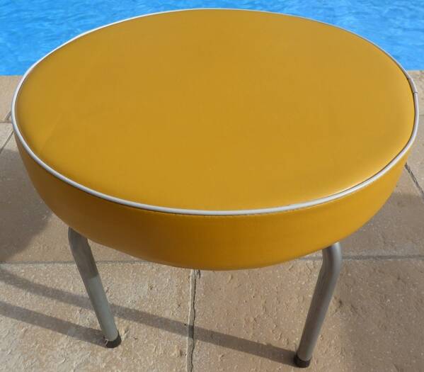 1 vintage round stool in yellow imitation leather
