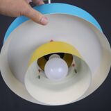 Unique colorful swedish design lamp in yellow and blue color
