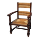 Armchair in stained oak and straw, French work from 1950.