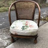Vintage brown armchair in floral fabric and mahogany wood, 1950s, low back.