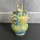 Yellow floral decoration water bottle