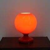 Red allglass table lamp designed  by Štefan Tabery,1960
