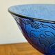 Bluish glass fruit bowl