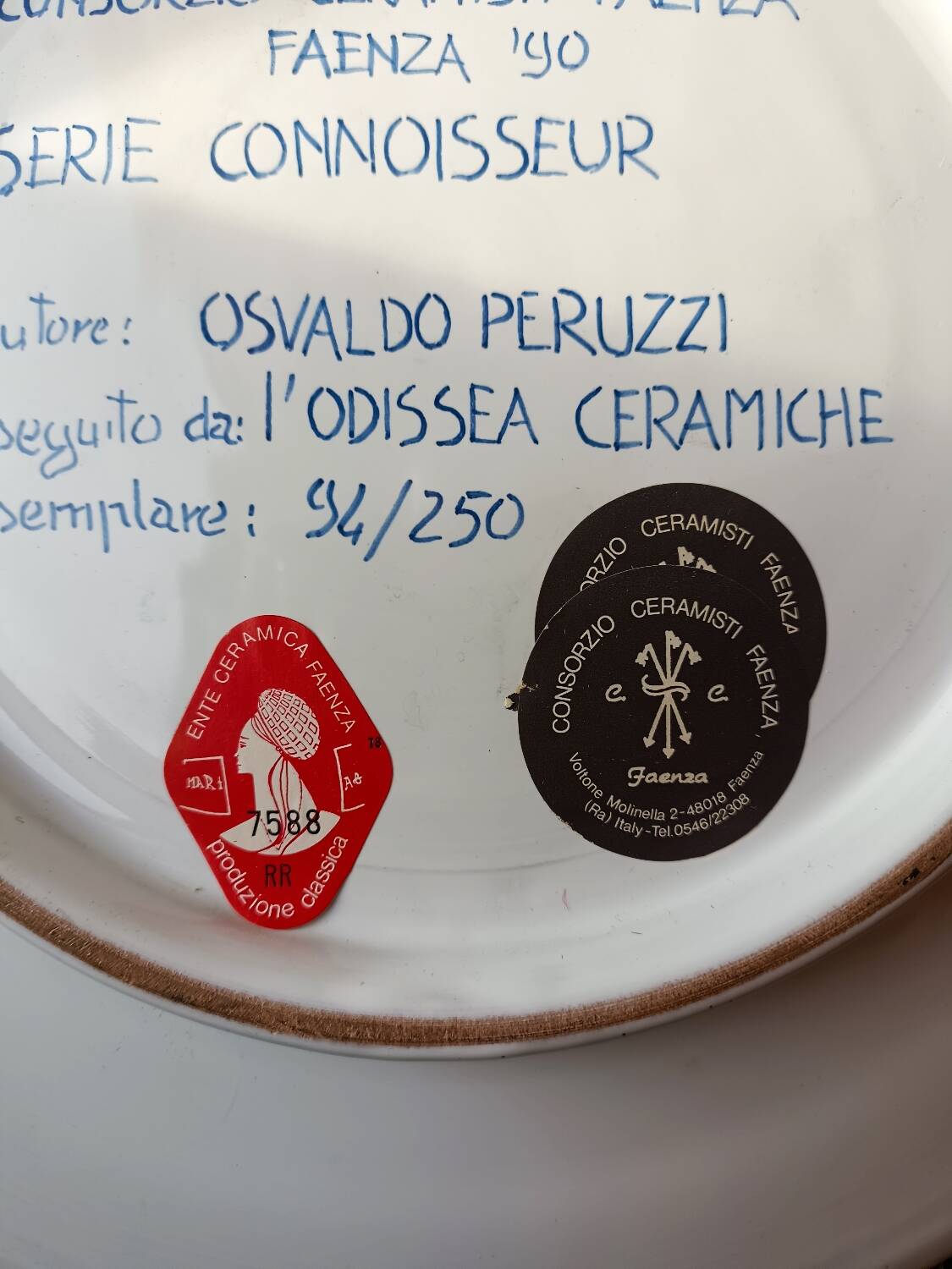 Osvaldo Perruzzi designer of polychrome faience plates.